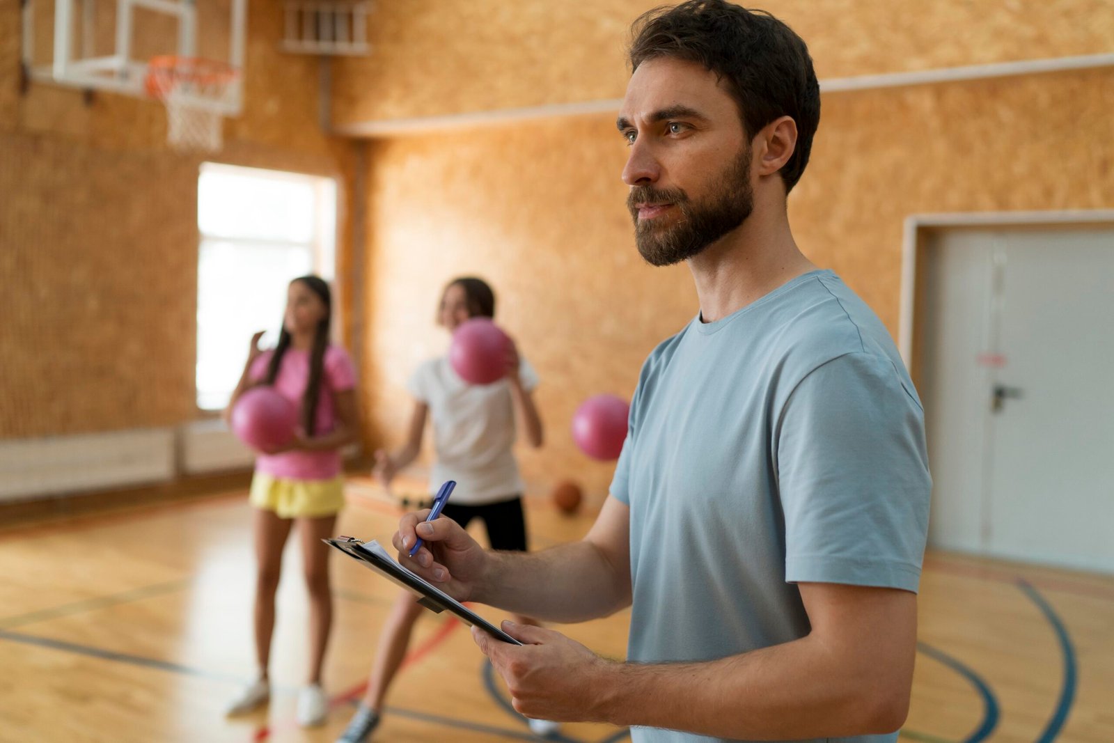 medium-shot-girls-teacher-gym